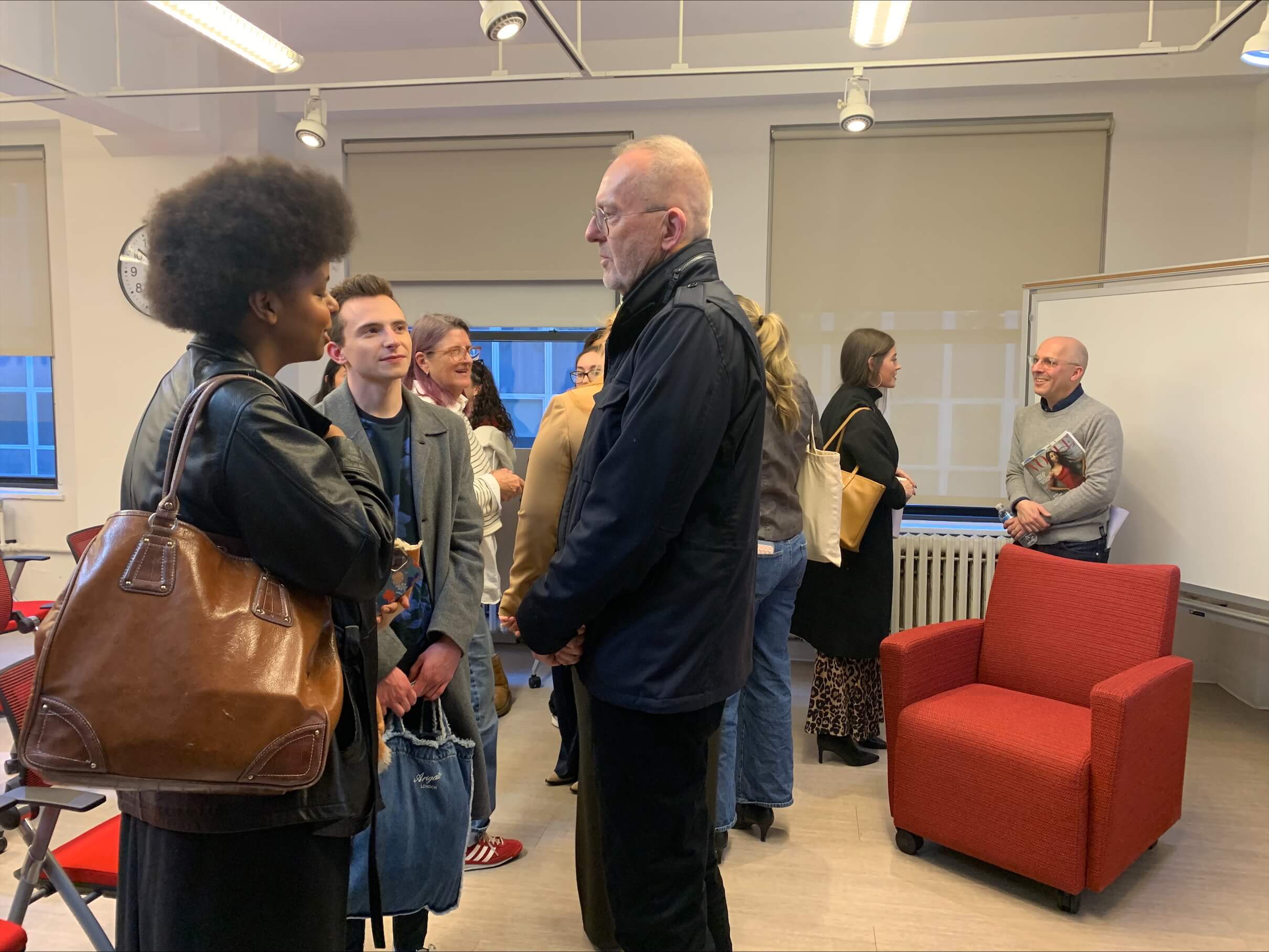 Jim and Ivan speaking with LIM students, post event.