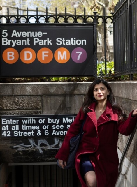 Female student, dark hair, exiting subway at 5th Avenue - Bryant Park Station