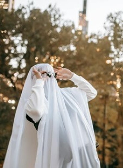 People in Central Park wearing ghost sheets