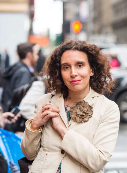 Woman posing for photo on the street