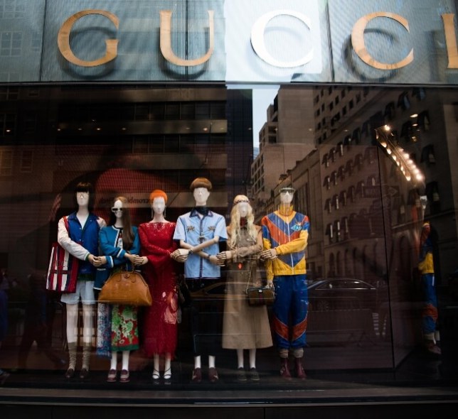 Gucci store window, multiple mannequins