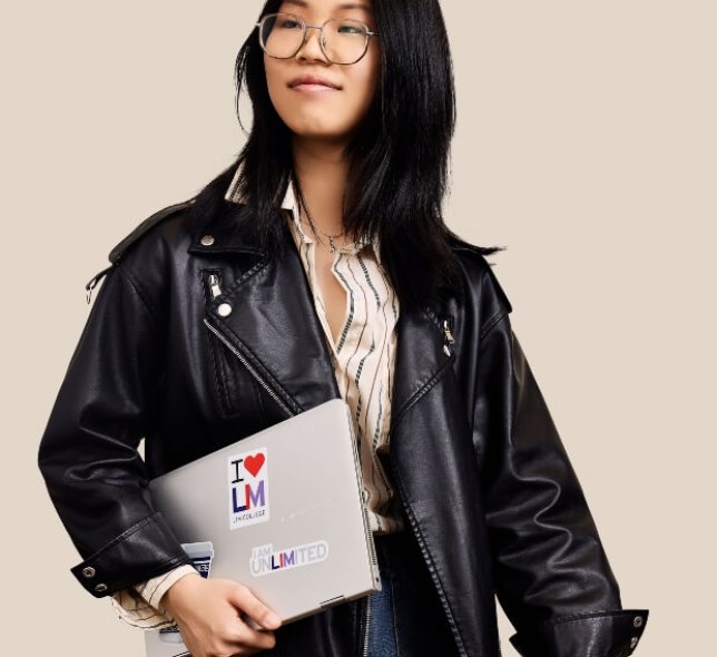 Anjing, black leather jacket, LIM laptop, medium shot