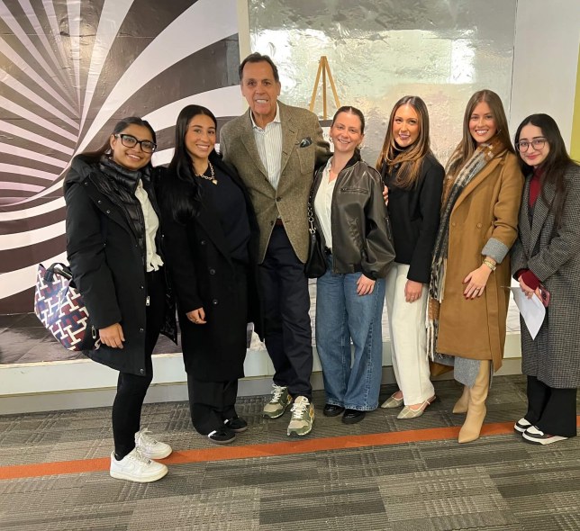 Sam Edelman with students on LIM's campus