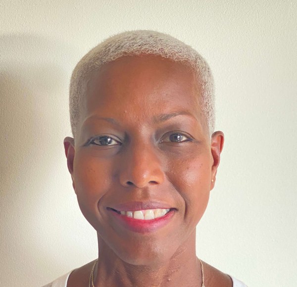 headshot of a woman in front of white background