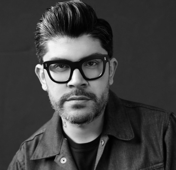 black and white photo of a man in glasses