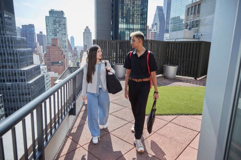 2 people on roof of FOUND Study